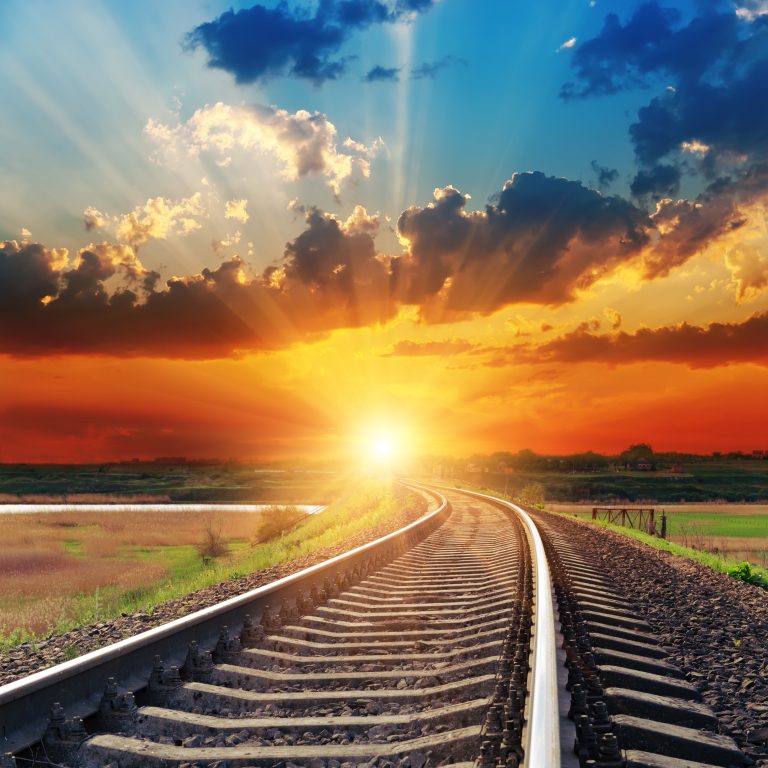 A sunset over train tracks